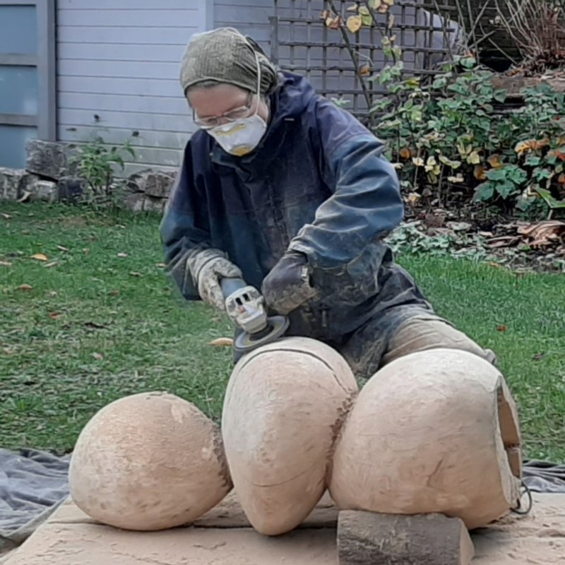 The artist, working on the the sculpture Three round forms.