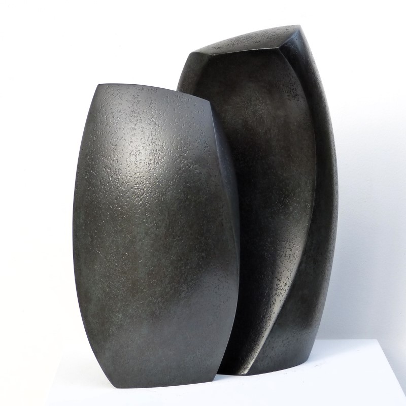 Black abstract two piece sculpture.