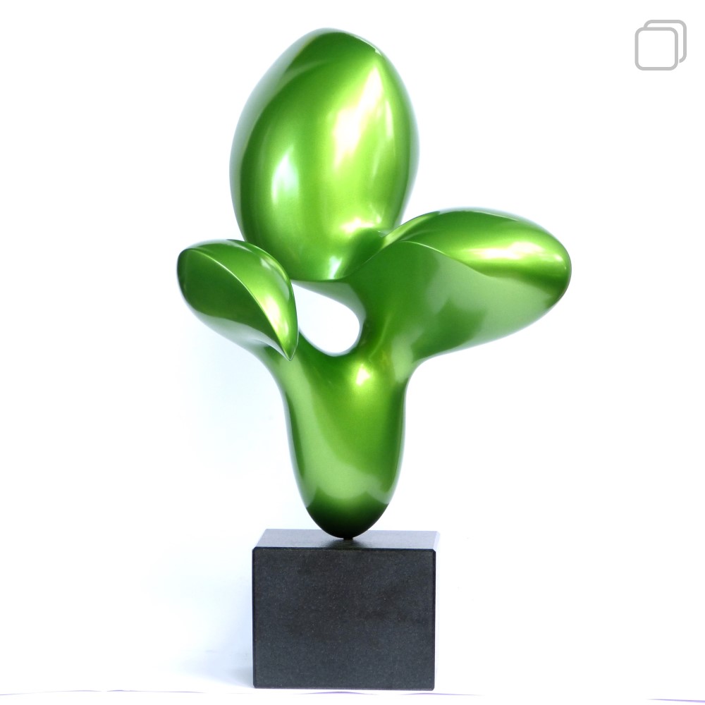 abstract organic sculpture with a shiny green surface on a black granite base