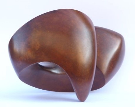 Abstract bronze sculpture with round shapes and smooth surfaces, dark brown patinated. The sculpture rests on only two points and keeps itself balanced.